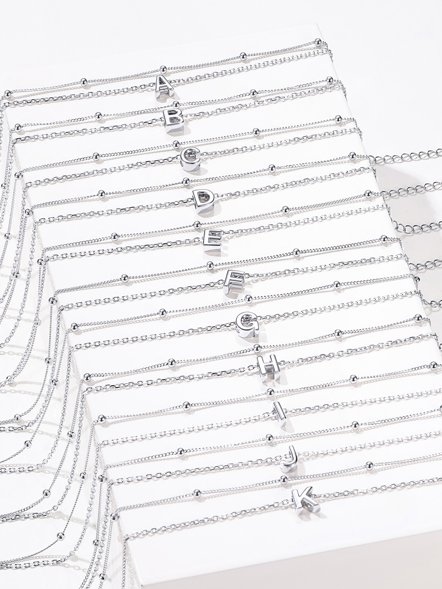 Sterling Silver Dainty Layered Waterproof Initial Anklets in different letter