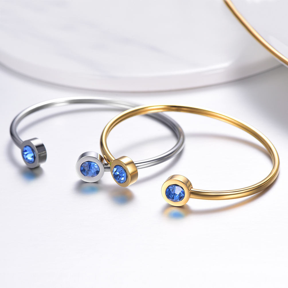 Adjustable blue zircon cuff bracelet steel and gold