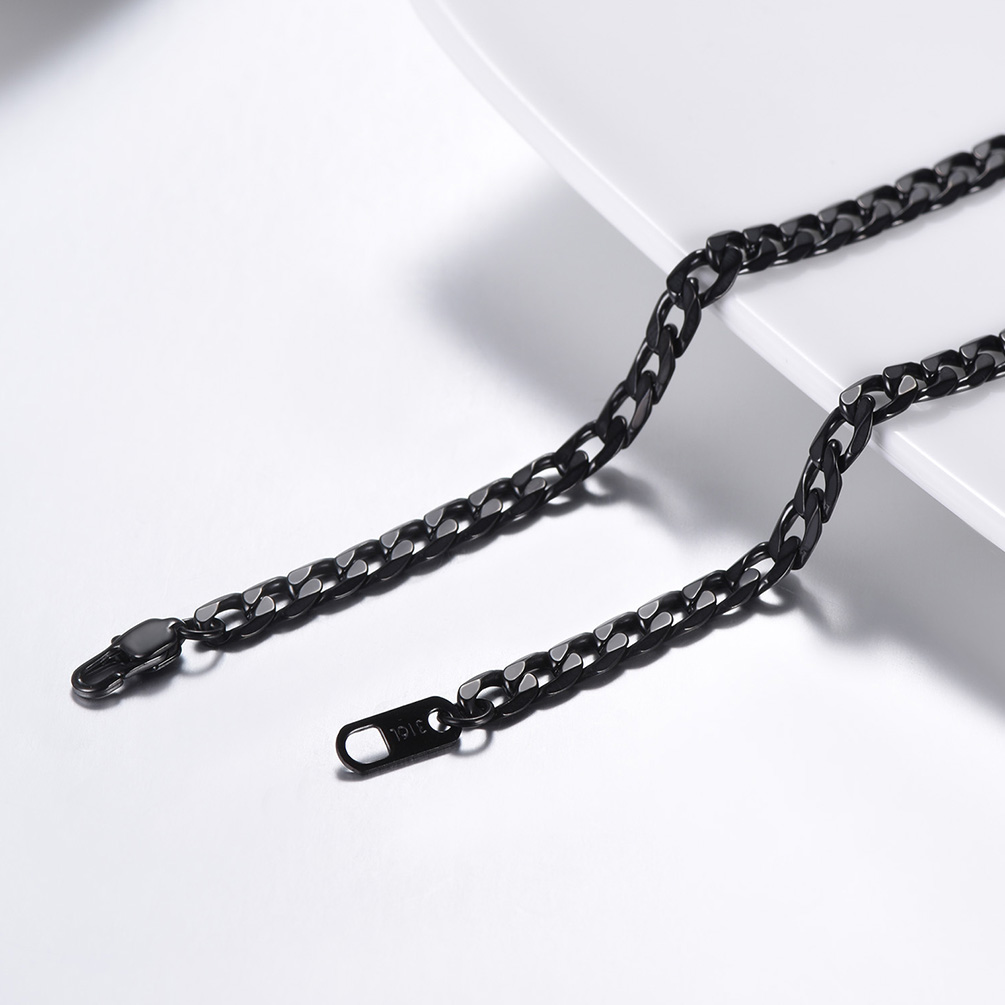 Black stainless steel Cuban chain necklace flat lay