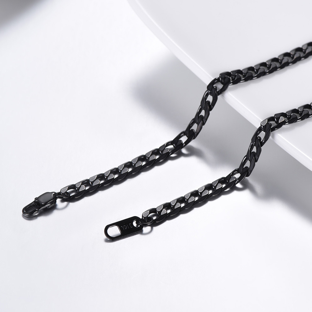 Black stainless steel Cuban chain necklace flat lay