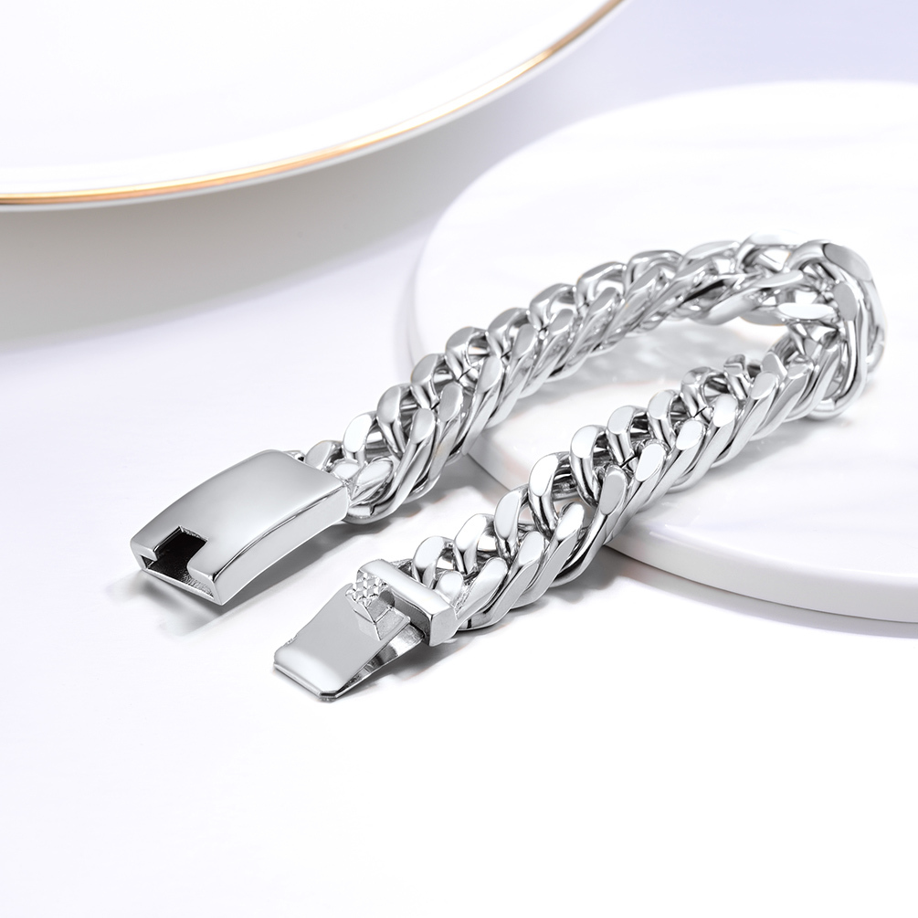 Cuban link bracelet flat lay