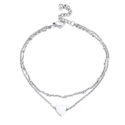 double chain anklet with beaded design and heart charm on white background