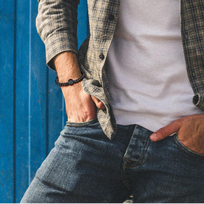 Black beads bracelet on men wrist