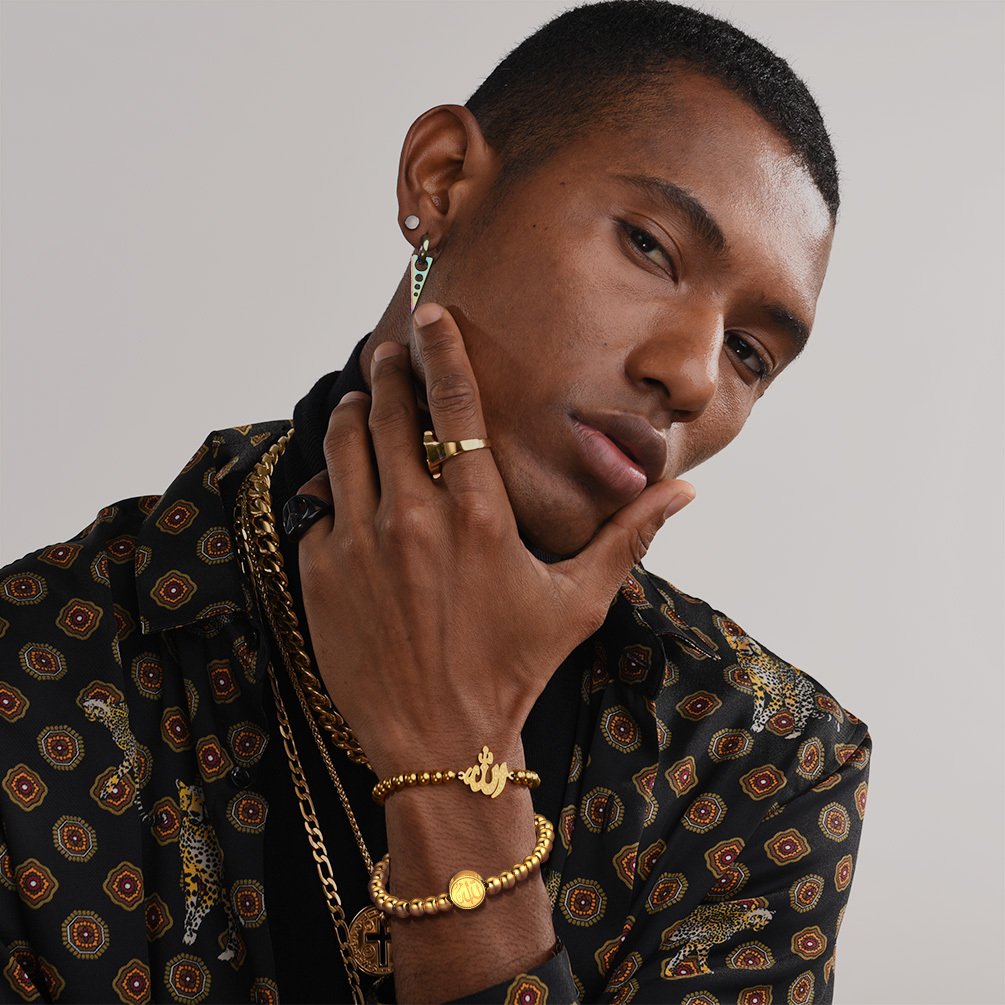 Gold beads bracelet worn on wrist