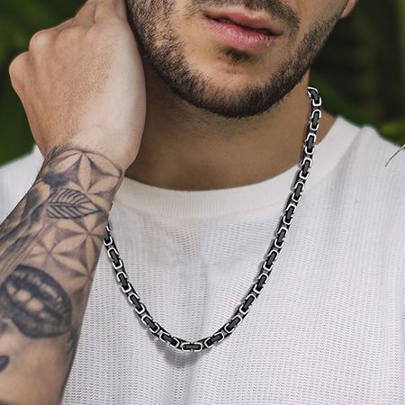 wearing Black and stainless steel square Byzantine chain necklace