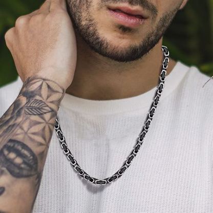 wearing Black and stainless steel square Byzantine chain necklace