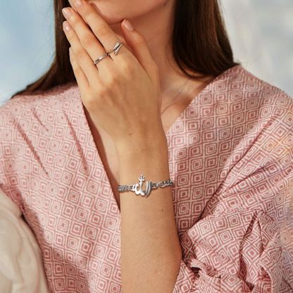 Women wearing Allah chain bracelet