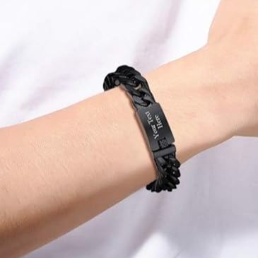 Black Cuban bracelet worn on wrist