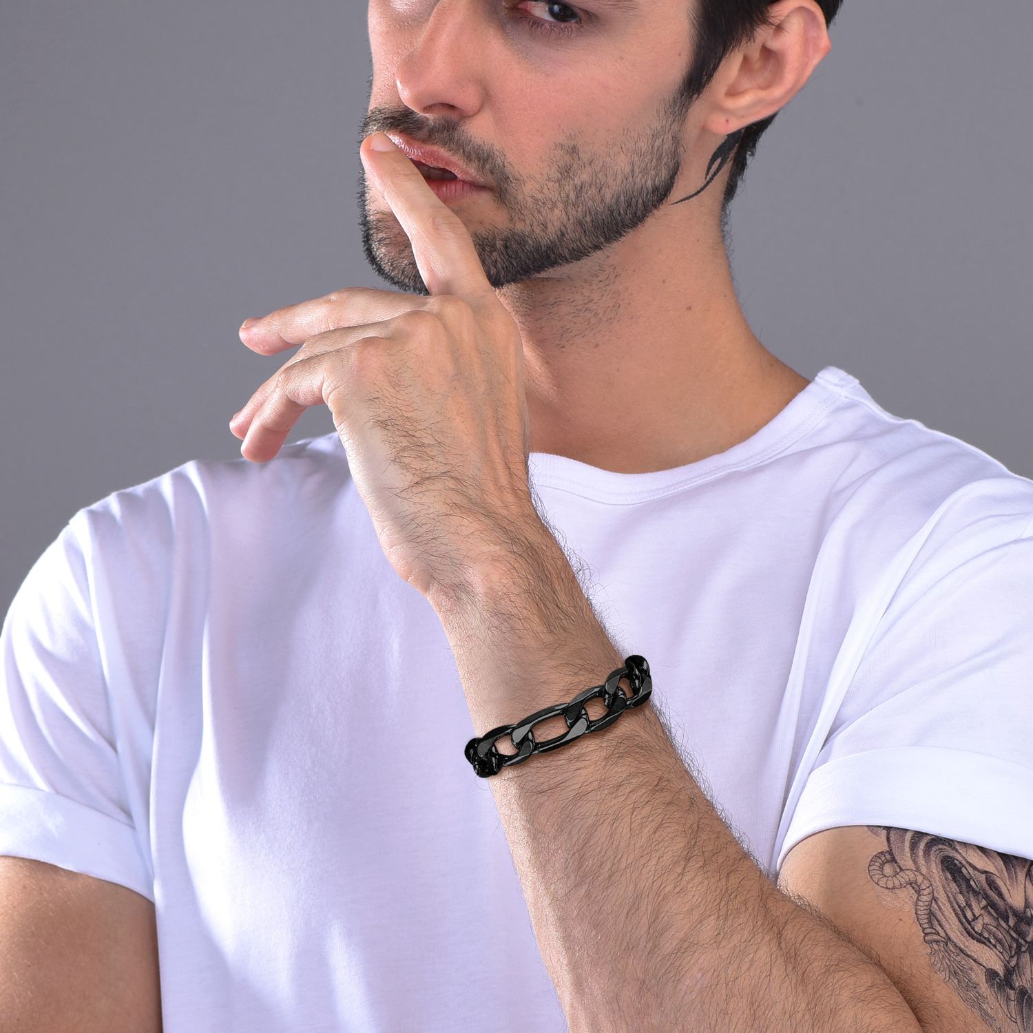 Men wearing black Figaro chain bracelet