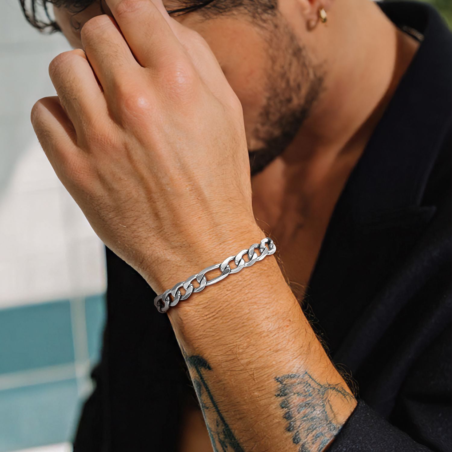 Man wearing Figaro stainless steel bracelet