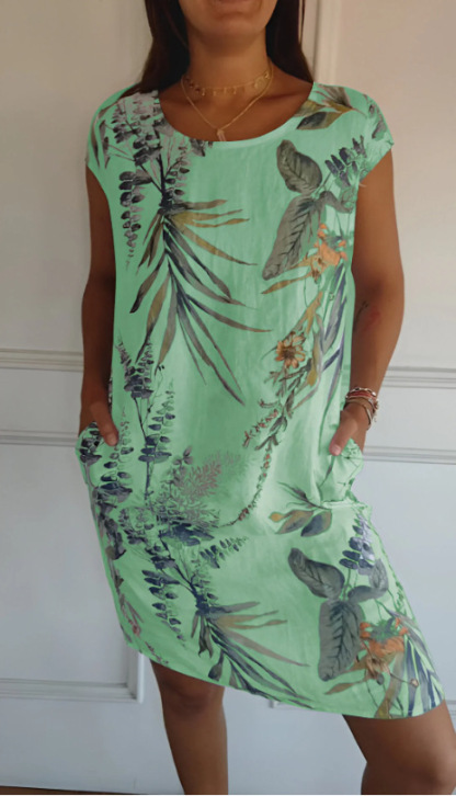 A Loose Printed Short-Sleeved Dress With Round Neck Pockets
