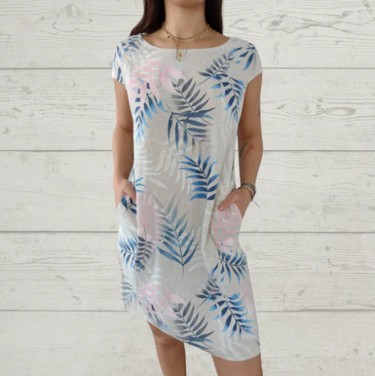 A Loose Printed Short-Sleeved Dress With Round Neck Pockets