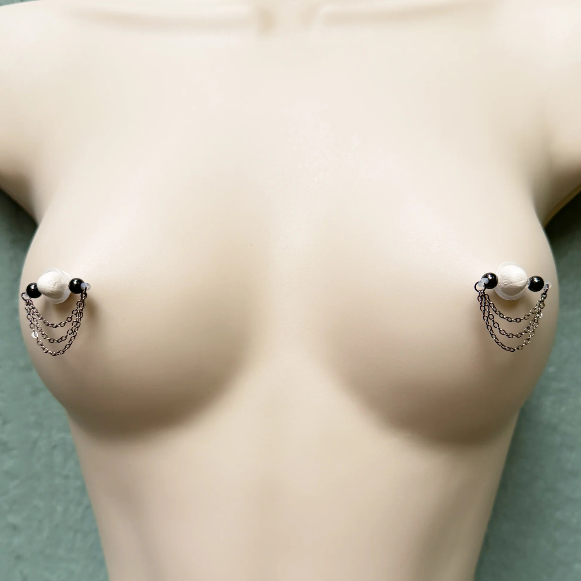 Black barbell nipple ring - triple chain