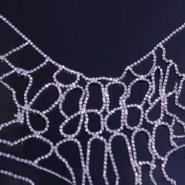 Runway-style sparkling body chain for evening wear