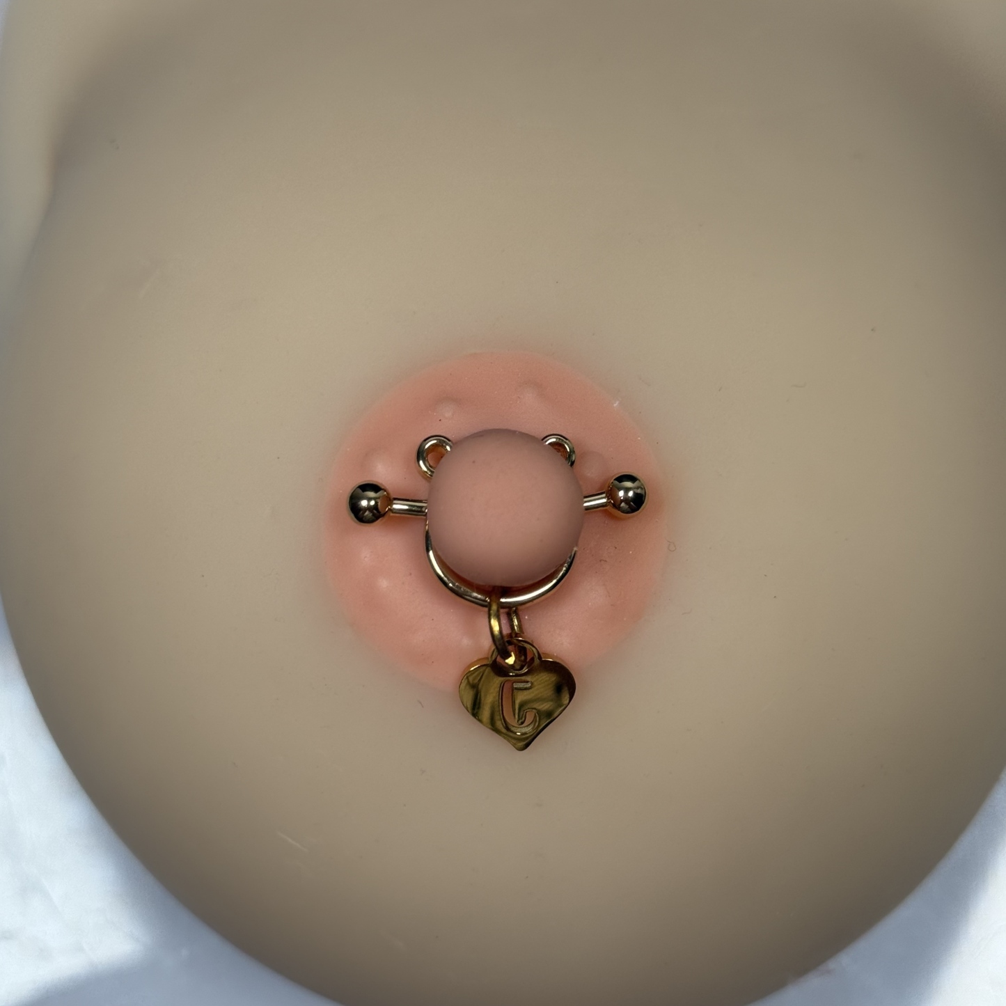 Custom letter nipple clamps