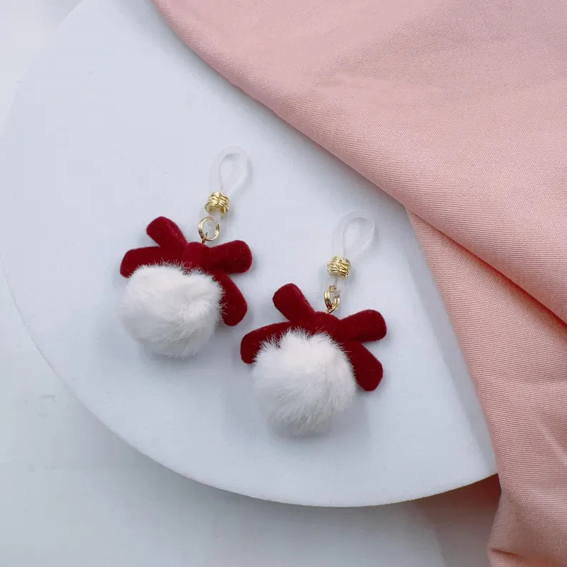 Christmas with velvet bow and fur ball nipple ring 
