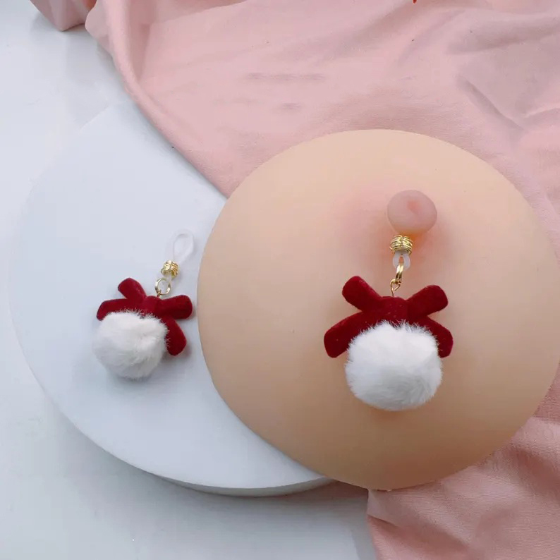 Christmas with velvet bow and fur ball nipple ring 