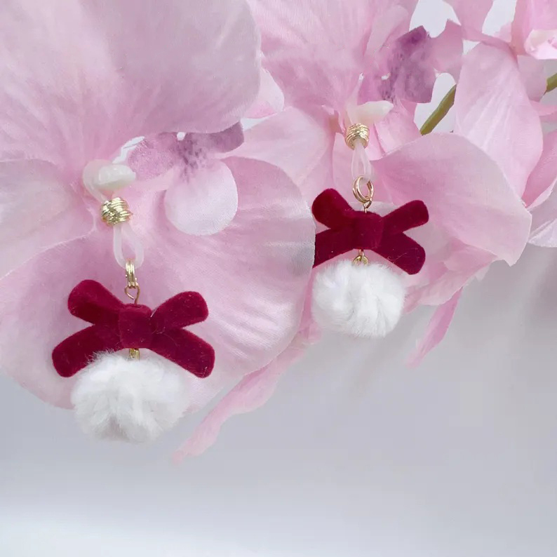 Christmas with velvet bow and fur ball nipple ring