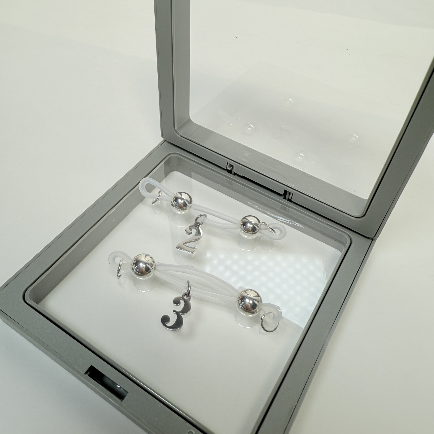 Adjustable nipple decoration - customizable with numbers 1-12