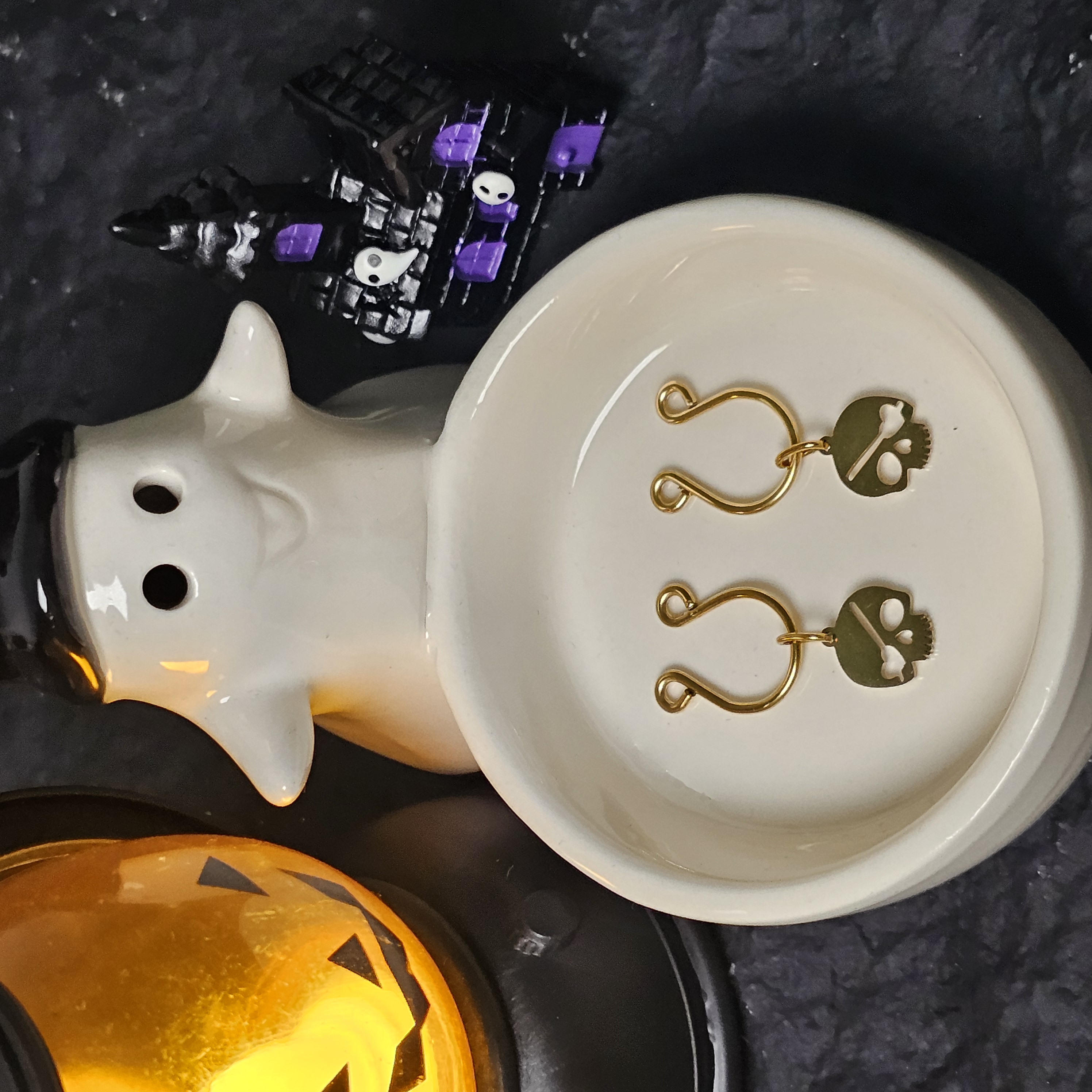 Gilded skull pendant