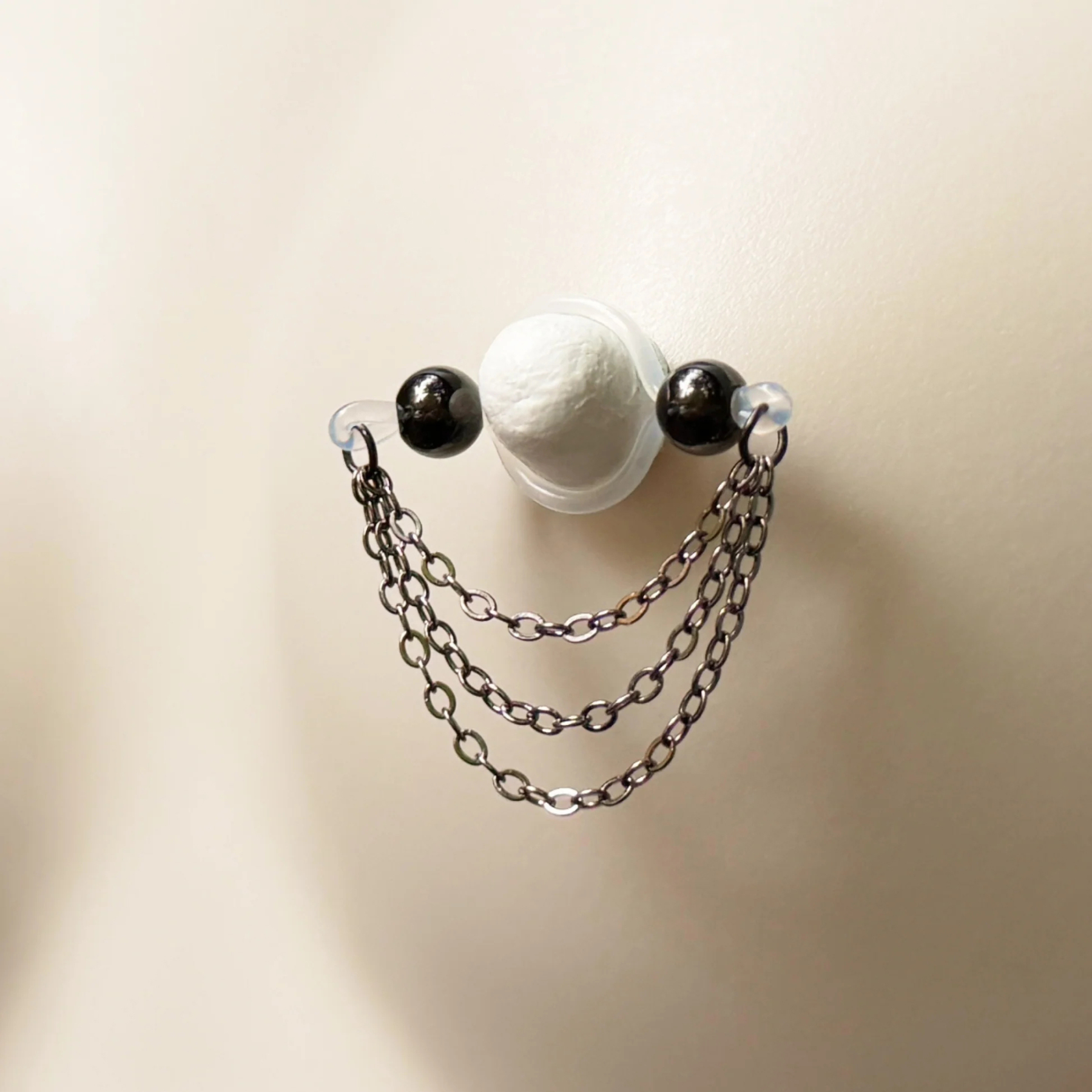 Black barbell nipple ring - triple chain