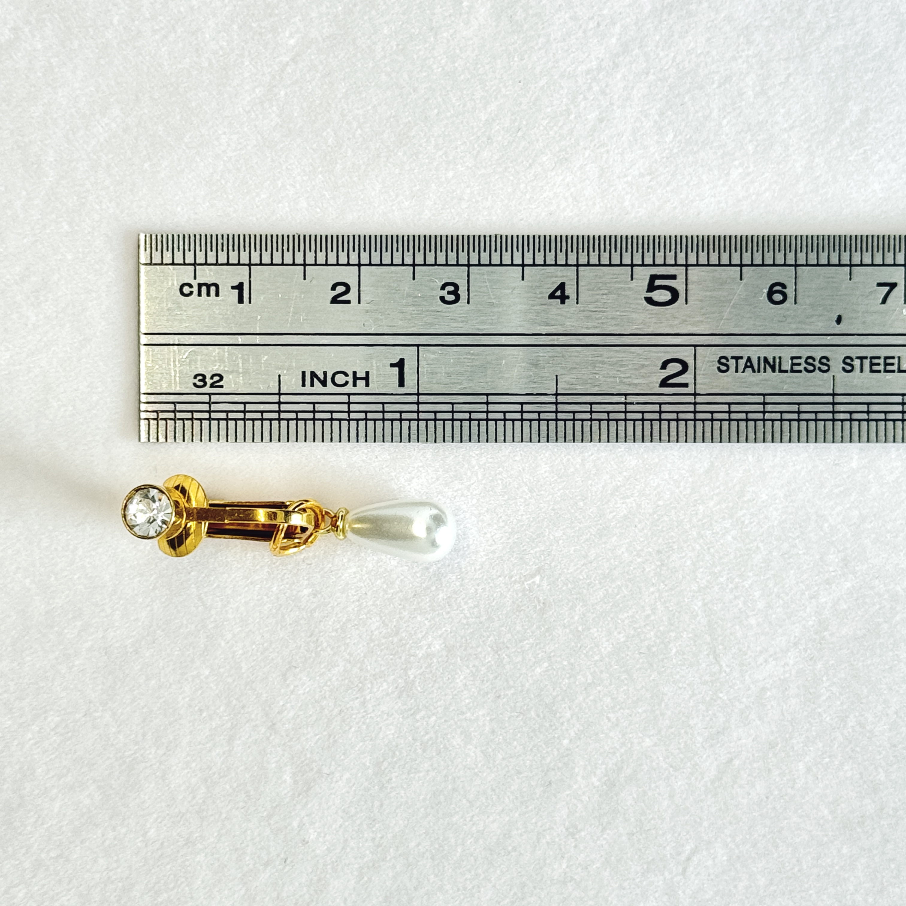 Adjustable pearl navel clip