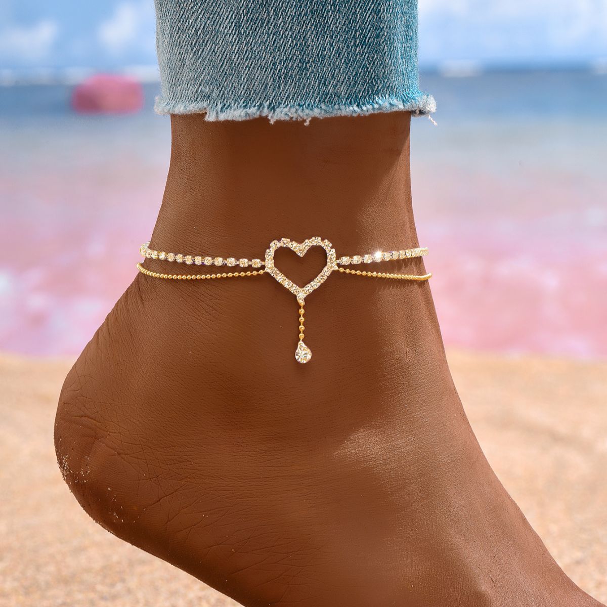 Diamond-encrusted heart-shaped anklet