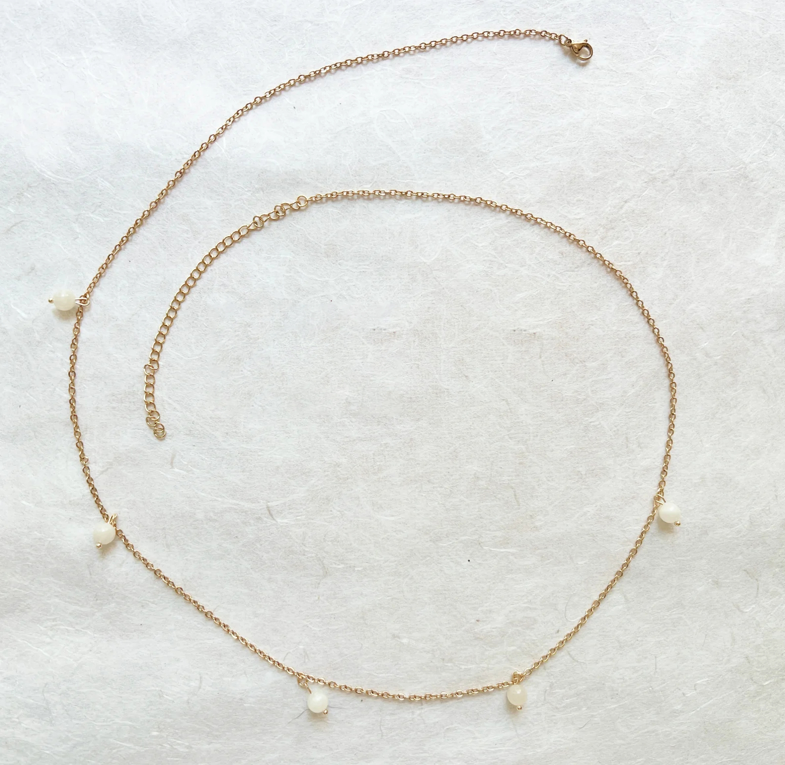 Pearl and moonlight-inspired waist chain