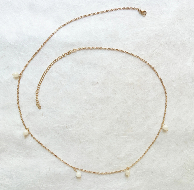 Pearl and moonlight-inspired waist chain