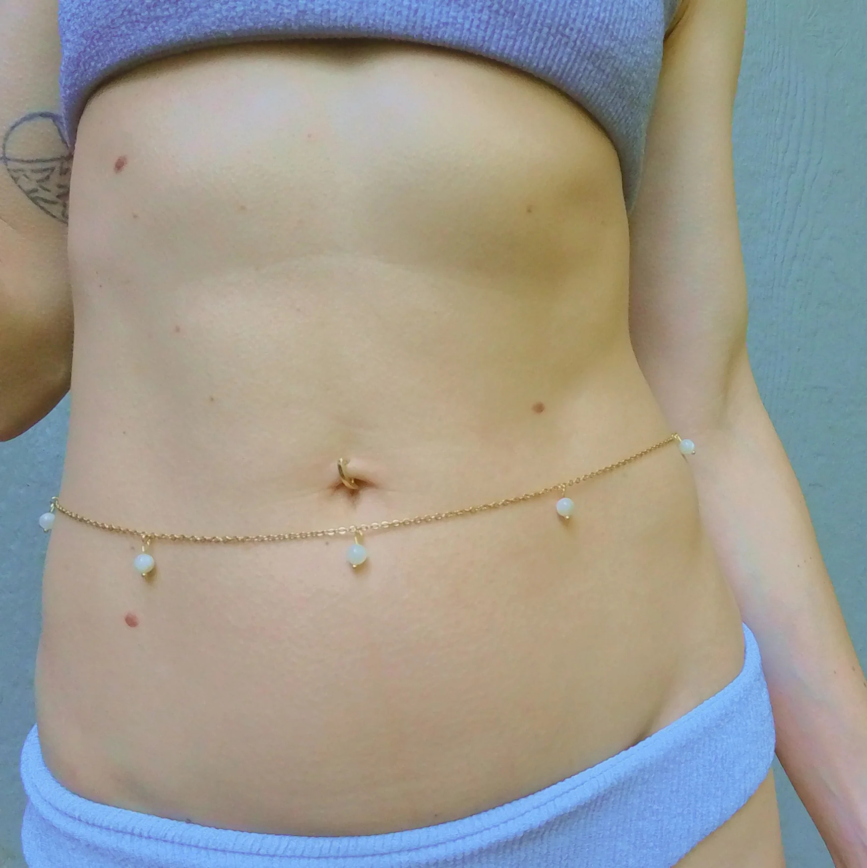 Pearl and moonlight-inspired waist chain