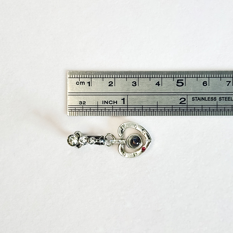 Navel jewelry featuring "I Love You" in a hundred languages.
