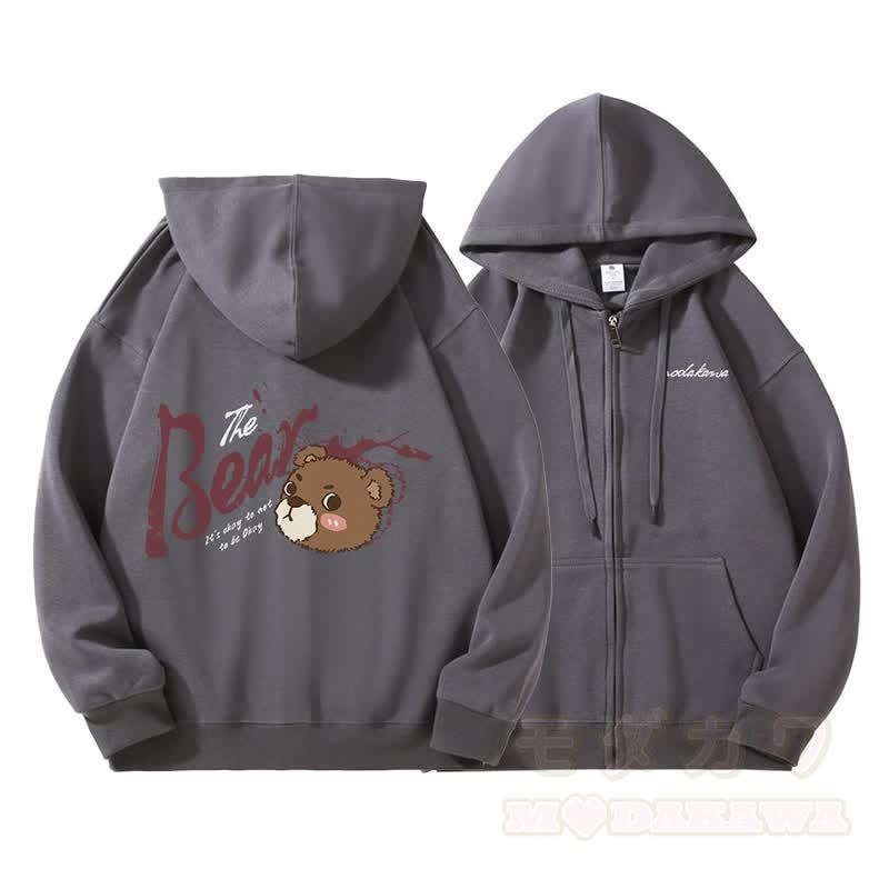 MODAKAWA IT'S OKAY TO NOT BE OKAY Kapuzenpullover mit Bären-Grafik und Reißverschluss - image 1