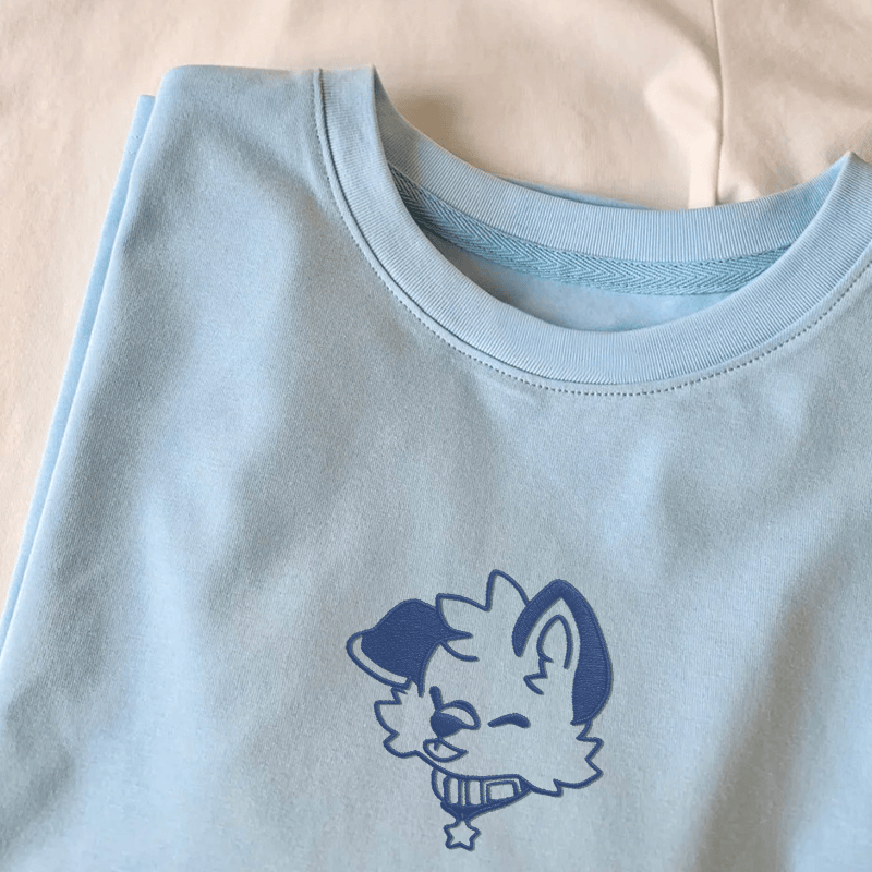 MODAKAWA X popipeko Besticktes T-Shirt aus Baumwolle mit fröhlichem Welpenmotiv - image 1