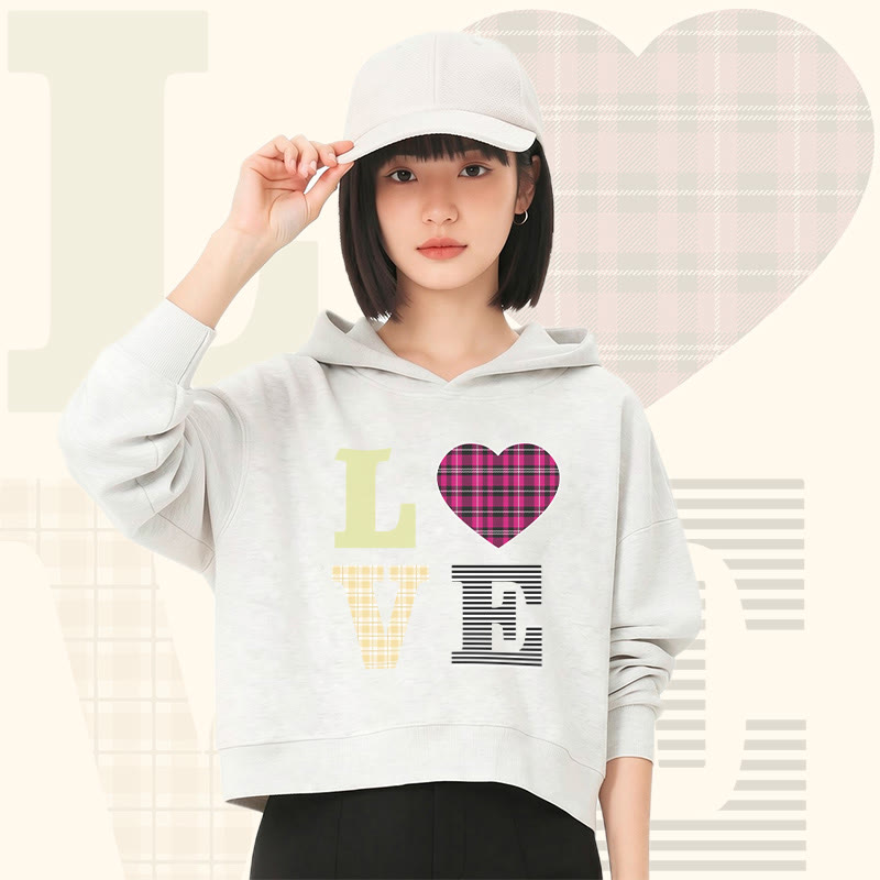 Modakawa Cropped Cotton Hoodie mit LOVE-Schriftzug - image 1