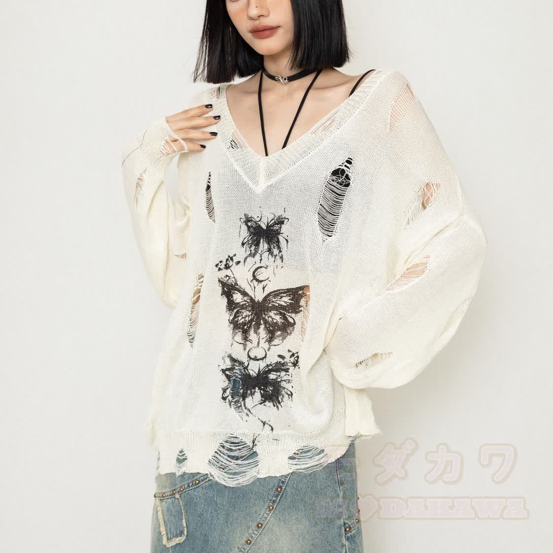 Oberteil mit Schmetterlingsmotiv im Used-Look, dazu passende Jeans mit weitem Bein - image 4