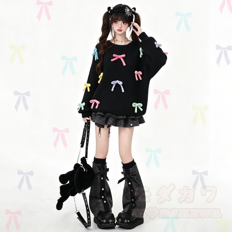 Bunter Strickpullover mit 3D-Schleife und Rundhalsausschnitt - image 1