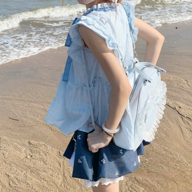 Zweiteiliges Set: Bluse mit zarten Schleifenärmeln, Rock mit Rüschen und Schleifenprint - image 3