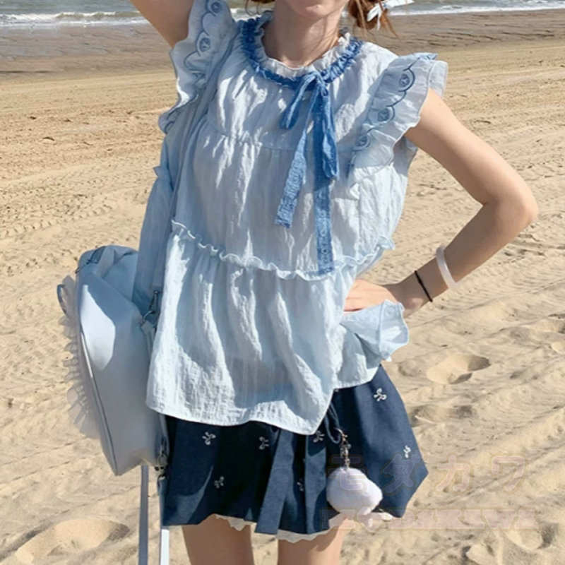 Zweiteiliges Set: Bluse mit zarten Schleifenärmeln, Rock mit Rüschen und Schleifenprint - image 2