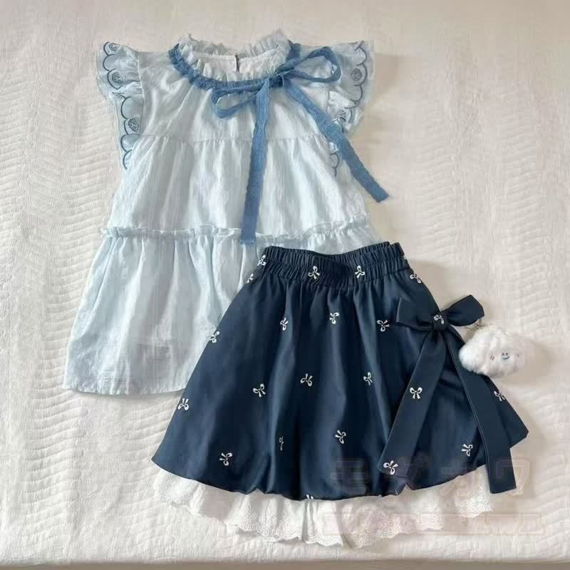 Zweiteiliges Set: Bluse mit zarten Schleifenärmeln, Rock mit Rüschen und Schleifenprint - Spitze - 2XL - image 7