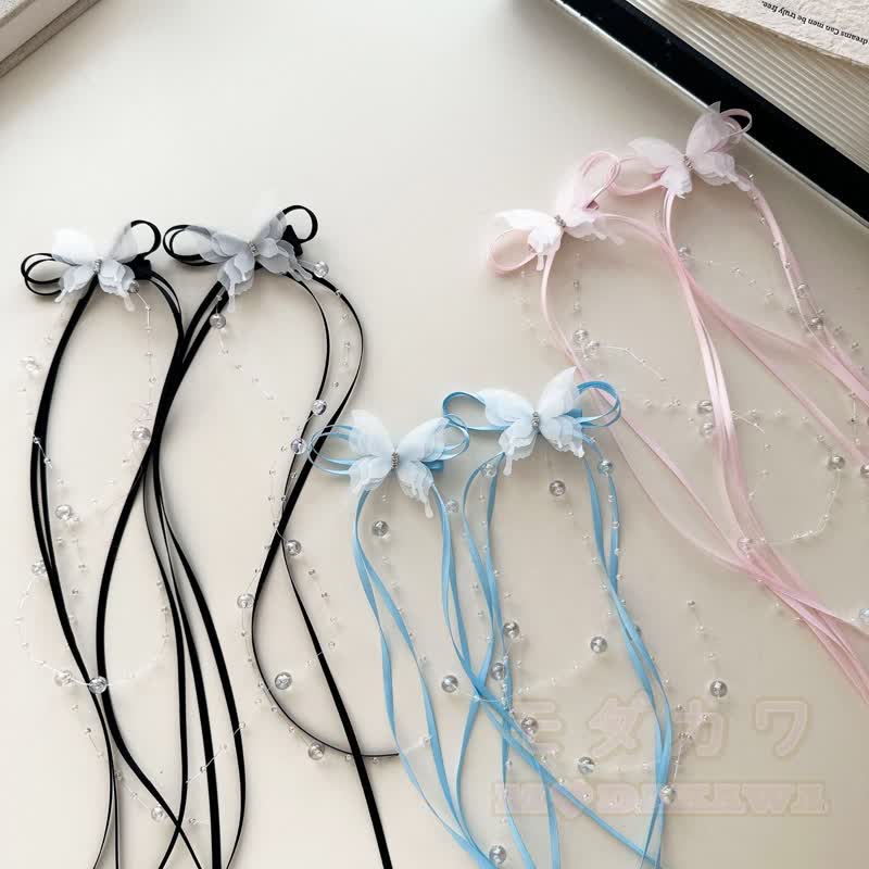 Süße Haaraccessoires mit Schleife, Perle und Quaste - image 1