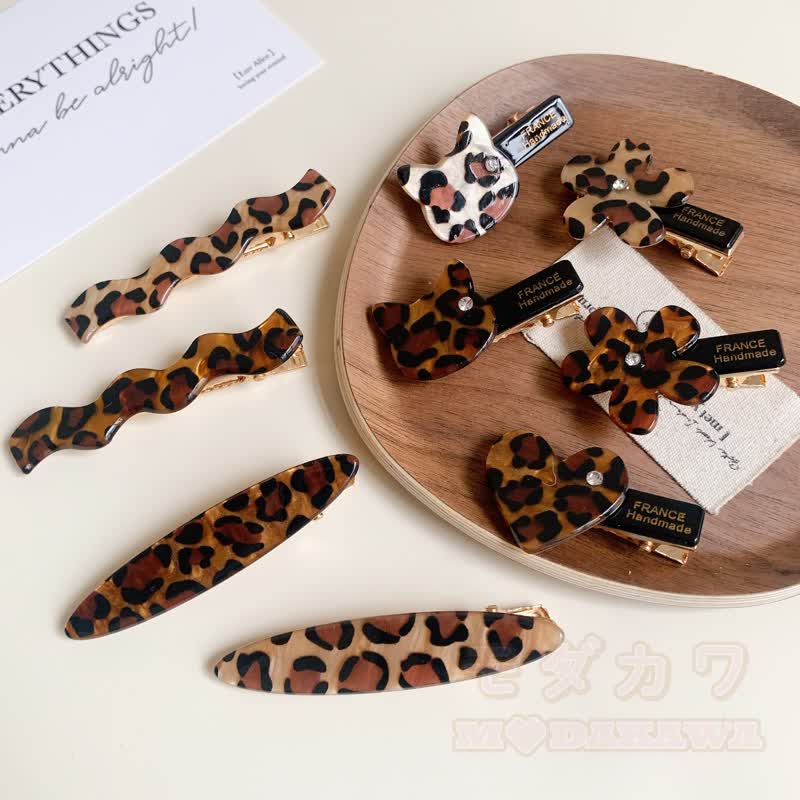 Vintage Haarspangen mit Leopardenmuster, Blumenherz und Wellenmuster - image 1