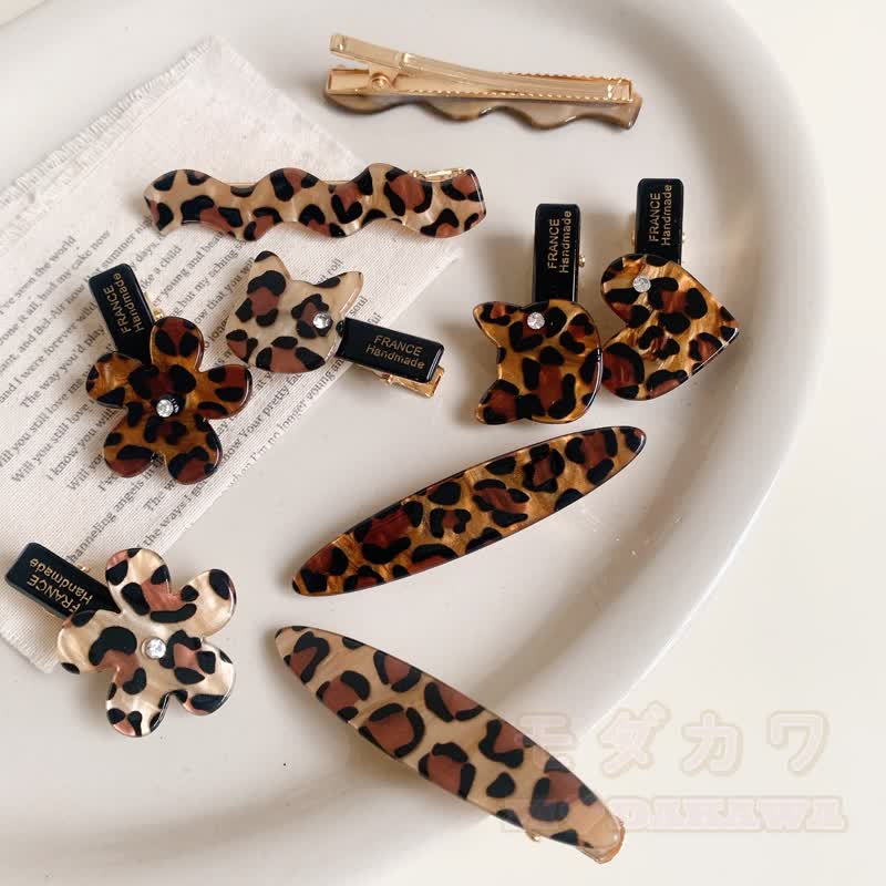 Vintage Haarspangen mit Leopardenmuster, Blumenherz und Wellenmuster - image 2