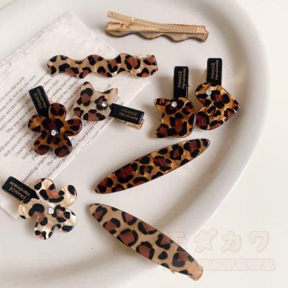 Vintage Haarspangen mit Leopardenmuster, Blumenherz und Wellenmuster - image 2