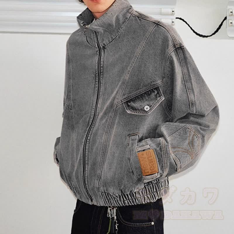 Vintage-Jeansjacke im Used-Look mit Stehkragen und Reißverschluss, dekonstruiert und aus gewaschenem Material - image 4
