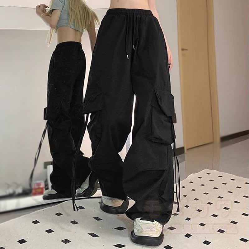 Zweiteiliges Set: Langarmshirt mit Schleife in Farben -Optik, weite Hose und passende Hose. - image 6