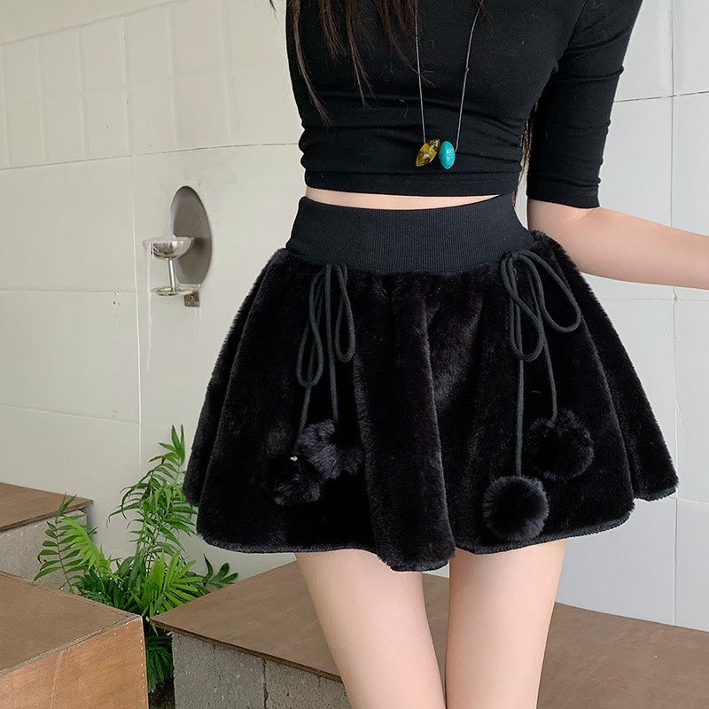 Minirock aus Wildleder mit Schleife und Bommel - Schwarz - One Size - image 9