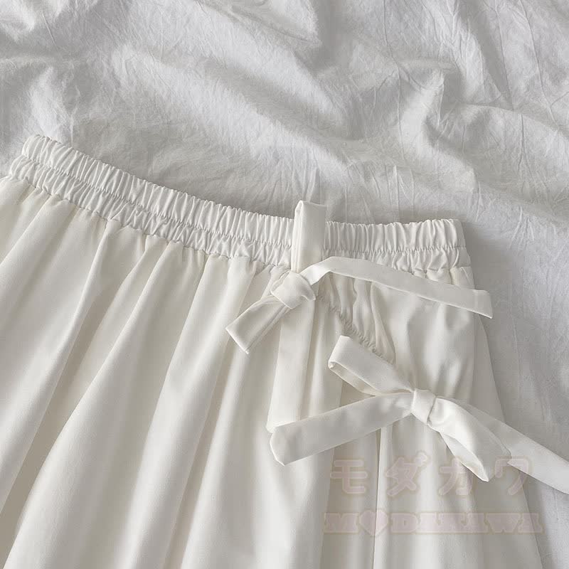 Unregelmäßiges Oberteil mit Schleife, passender Rock, Outfit - image 6