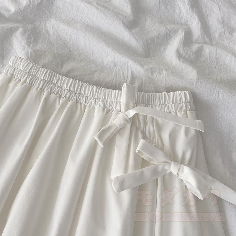Unregelmäßiges Oberteil mit Schleife, passender Rock, Outfit - image 6