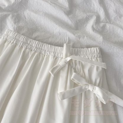 Unregelmäßiges Oberteil mit Schleife, passender Rock, Outfit - image 6