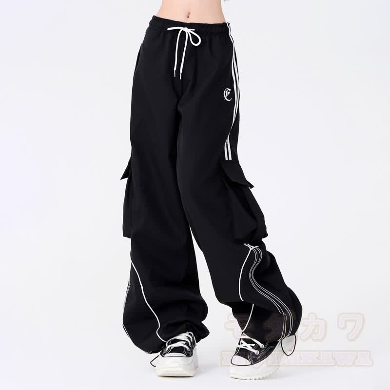 Zweiteiliges Set bestehend aus Hoodie mit Streifenmuster und Cargohose mit weitem Bein und Cargohose mit Cargo-Motiv und Hasenprint - image 7